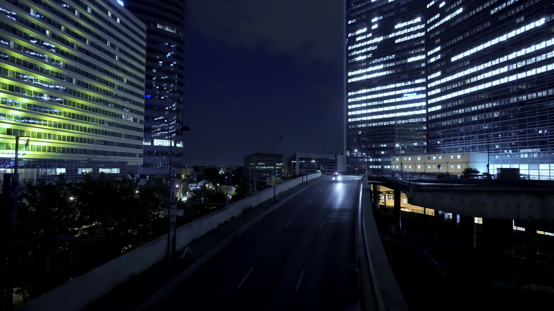 traffic lights modern buildings urban background time lapse of city at night bppohxou D