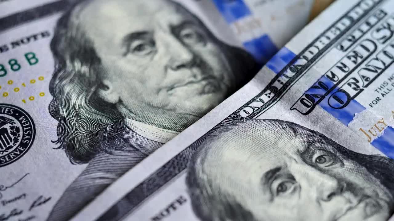 Stock Video 100 dollar bills on a rotating surface PC Live Wallpaper