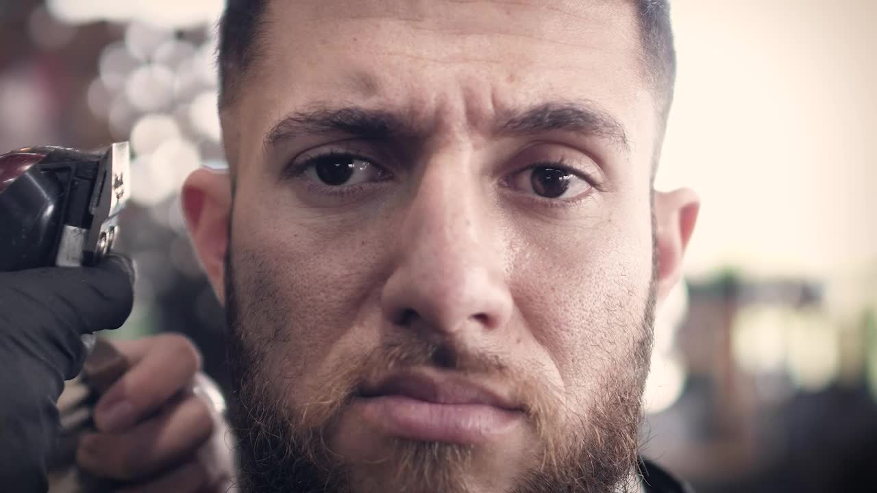 Stock Video A Bearded Man Getting A Haircut Live Wallpaper for PC