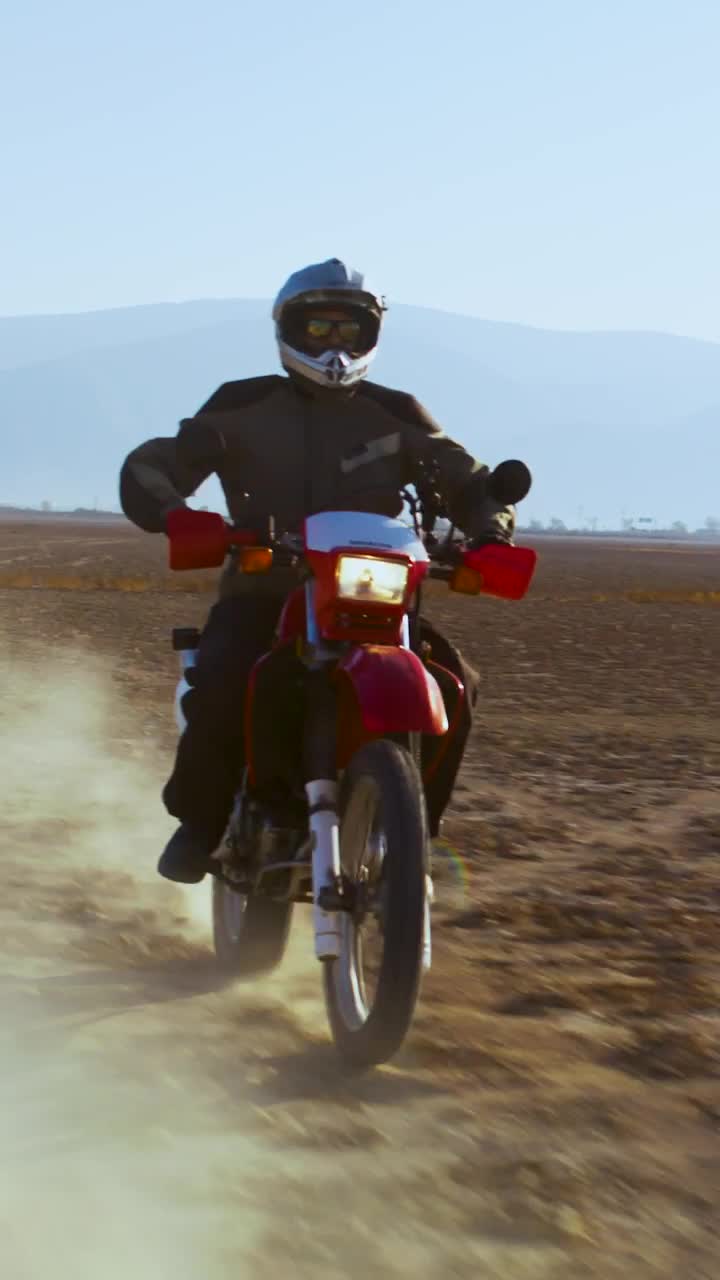 Stock Video A Biker Riding Through The Desert Live Wallpaper for PC