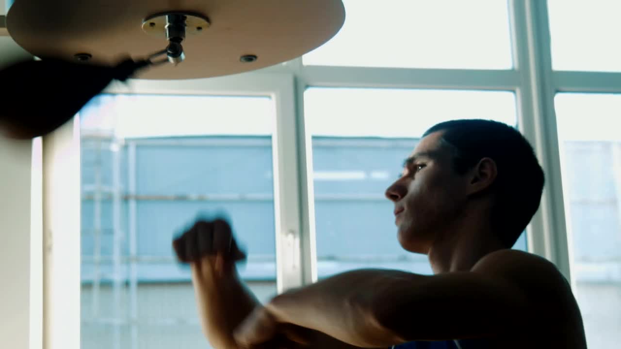 Stock Video A Boxer Hitting The Speed Punching Bag Live Wallpaper for PC