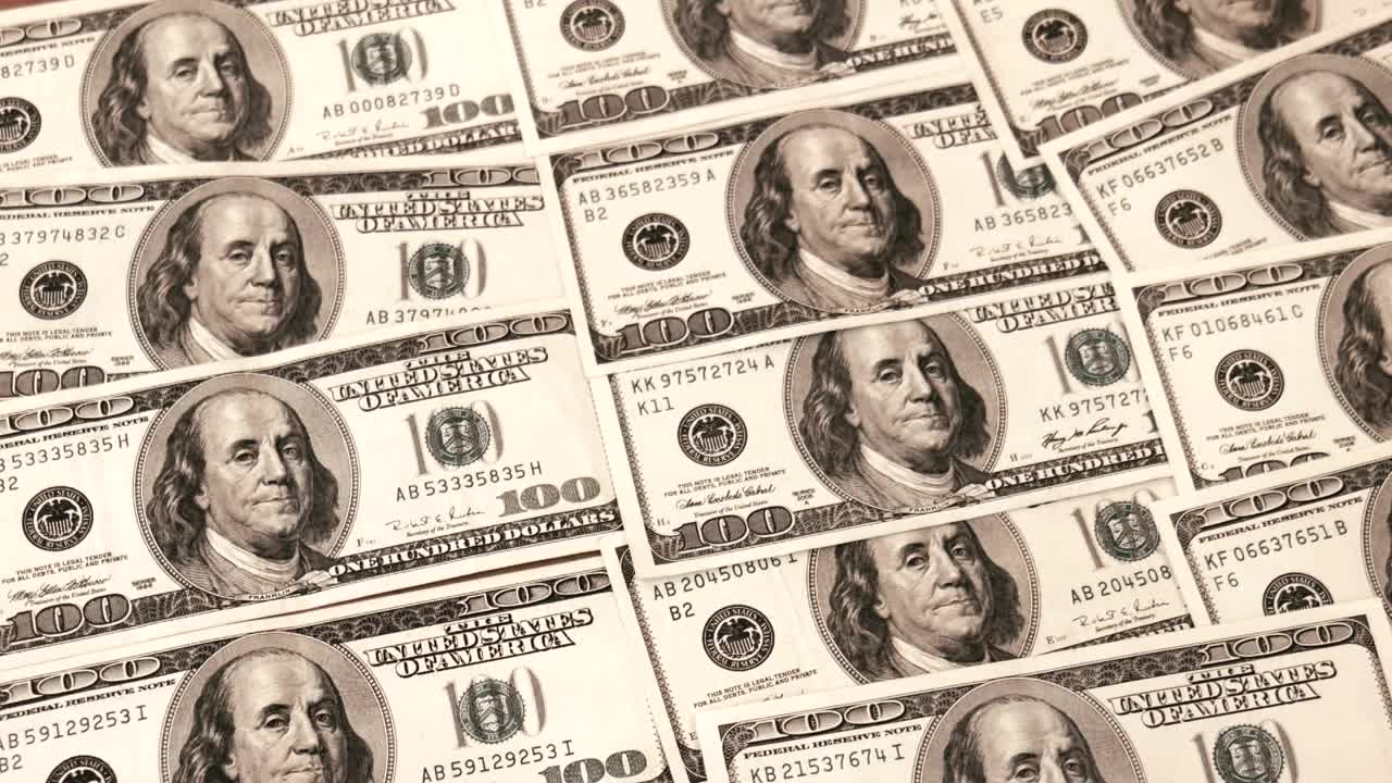 Stock Video A Bunch Of Dollars In The Table Live Wallpaper for PC