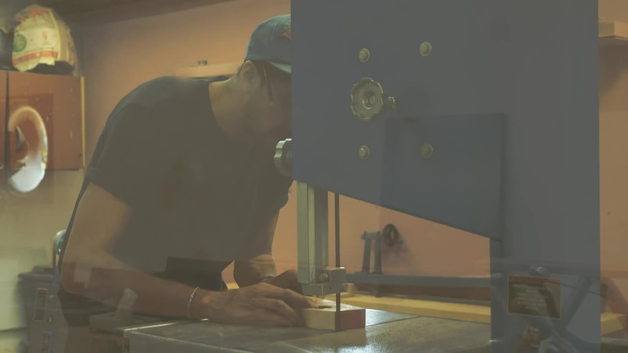 Stock Video A Carpenter Using A Sawing Machine Live Wallpaper for PC