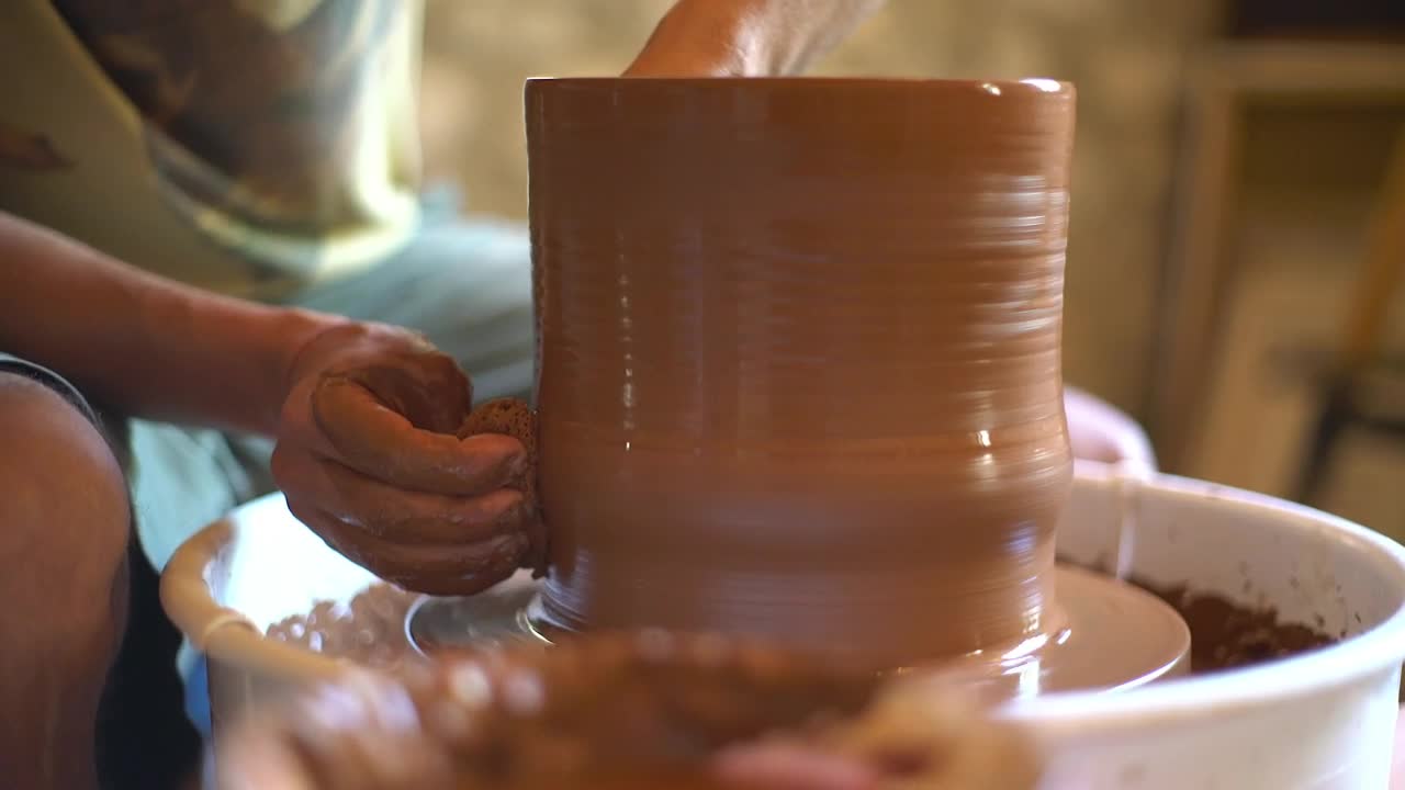 Stock Video A Ceramic Artist Making A Vase Live Wallpaper for PC