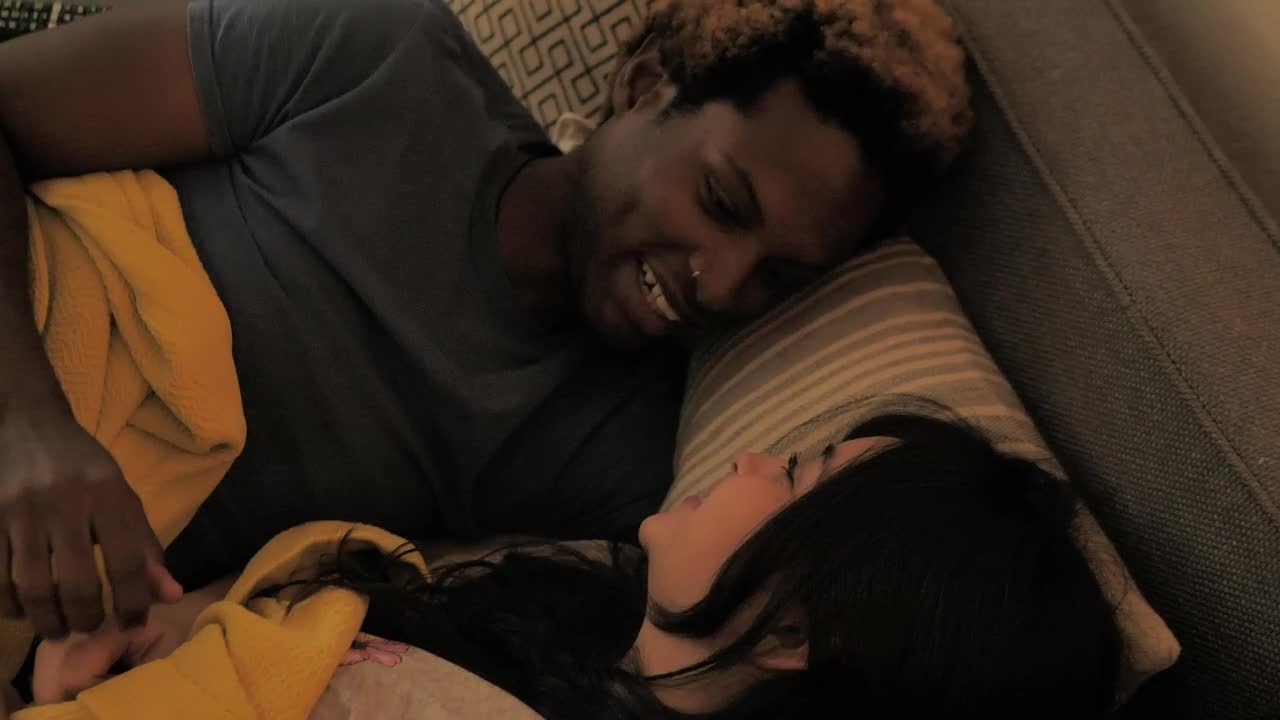 Stock Video A Couple Chats While Lying In Bed Live Wallpaper for PC