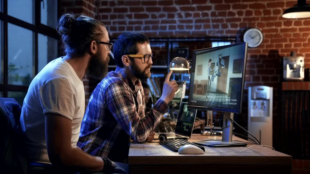 Stock Video A Couple Of Man Working On The Computer Live Wallpaper for PC