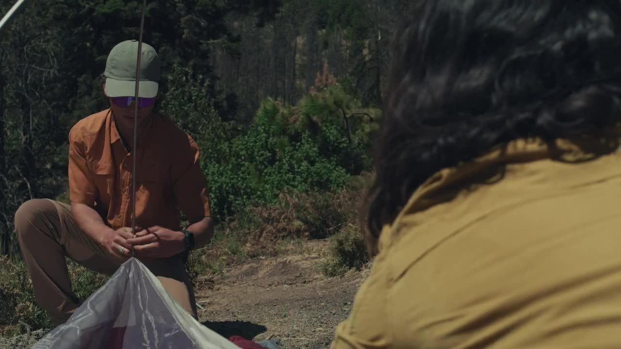 Stock Video A Couple Setting Up Their Camp Live Wallpaper for PC