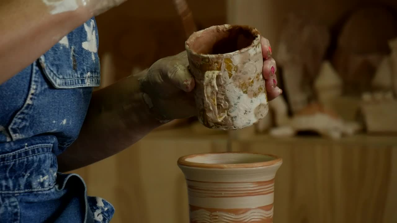 Stock Video A Craftsman Working On Rotating Pot Live Wallpaper for PC
