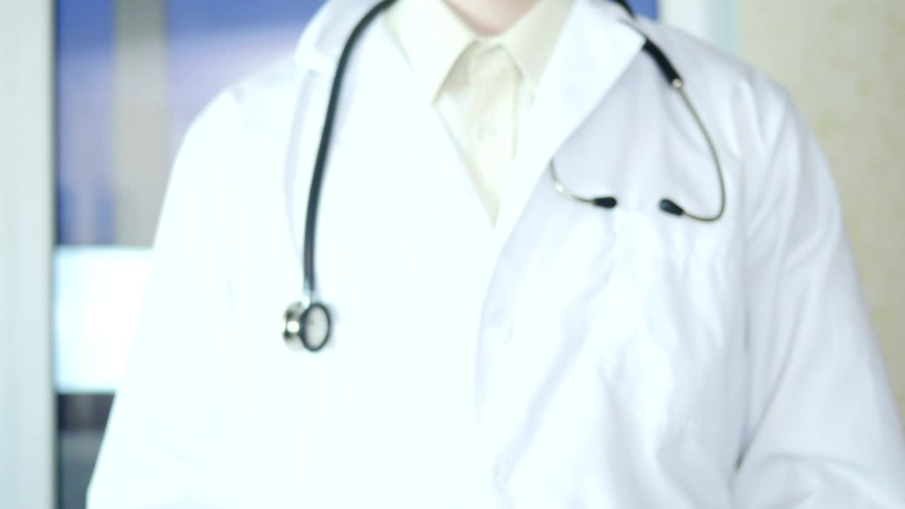 Stock Video A Doctor Making A Heart Shape With His Hands Live Wallpaper for PC