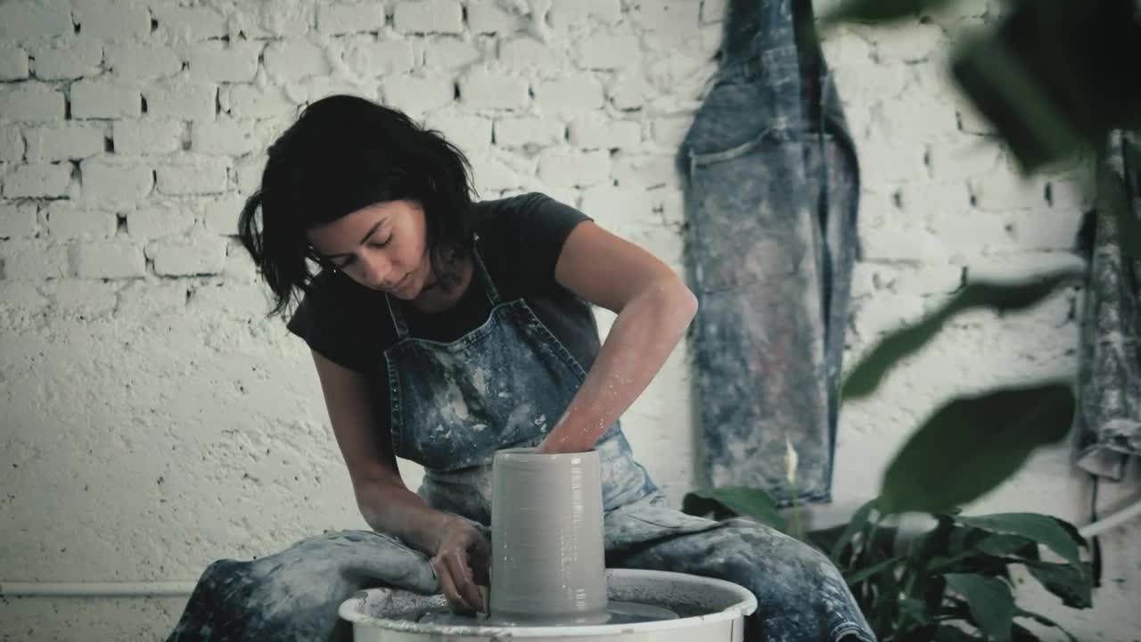 Stock Video A Female Ceramic Artist Working Live Wallpaper for PC