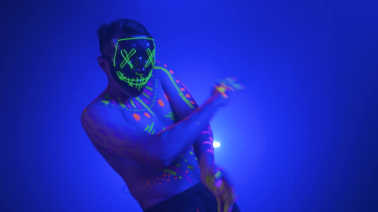 Stock Video Abstract Dance Of A Man With Mask In The Dark Live Wallpaper for PC