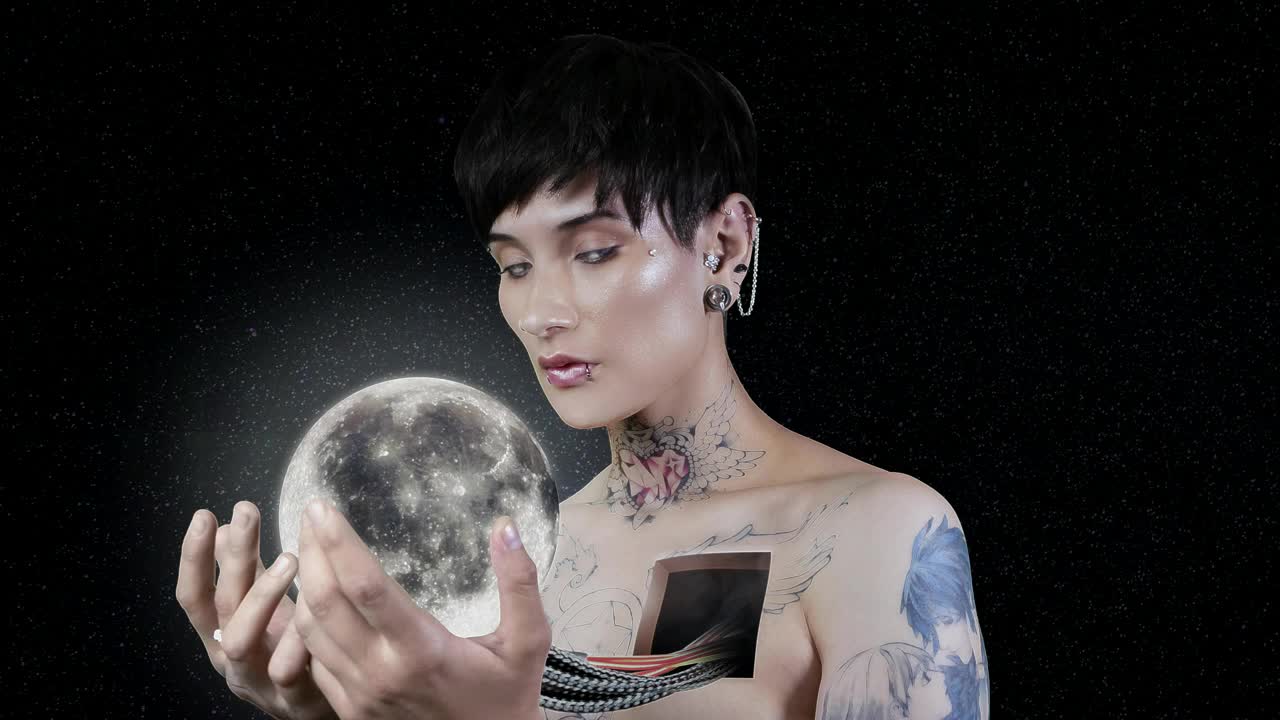 Stock Video Abstract Video Of A Woman Holding The Moon In Her Live Wallpaper for PC
