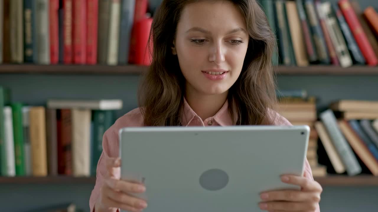 Stock Video Academic Studying With A Tablet At The University Library Live Wallpaper for PC