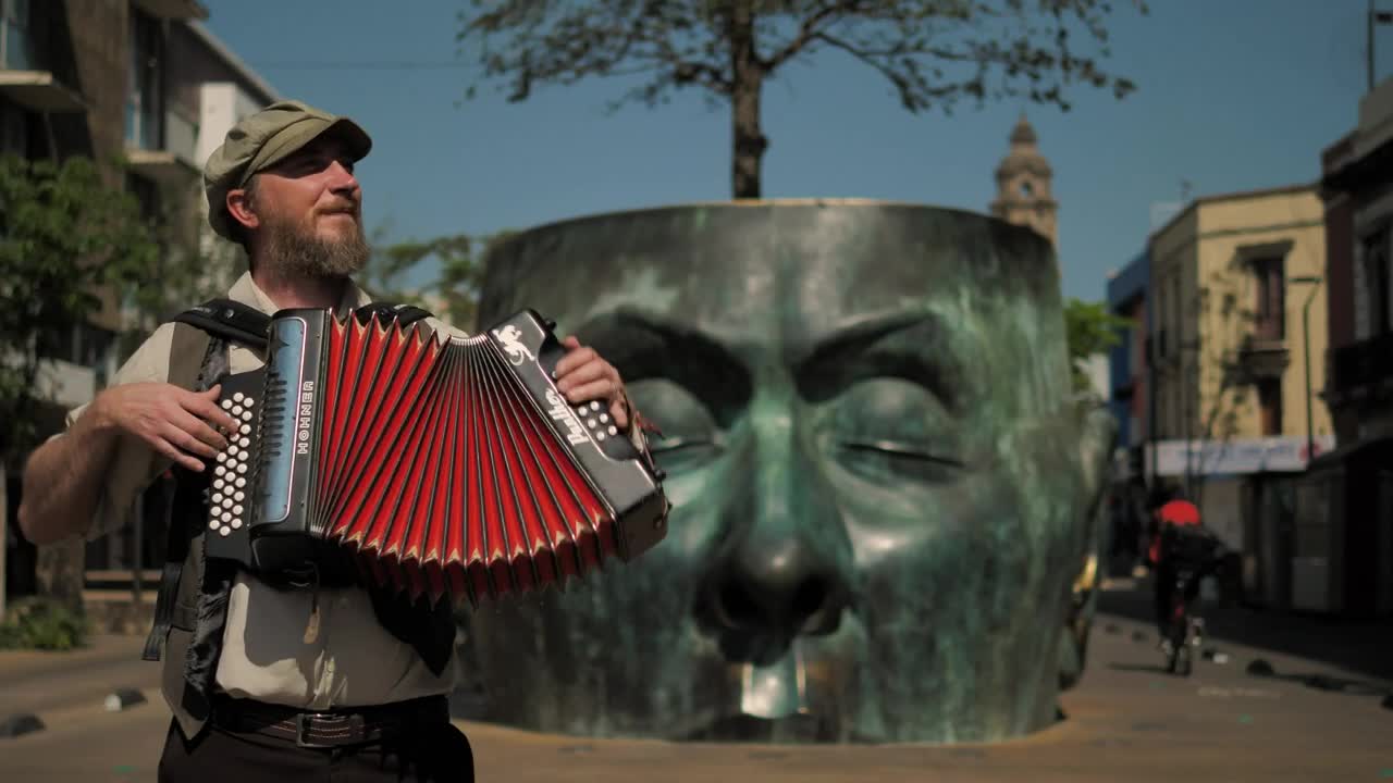 Stock Video Accordionist Playing A Song In The Street Live Wallpaper for PC