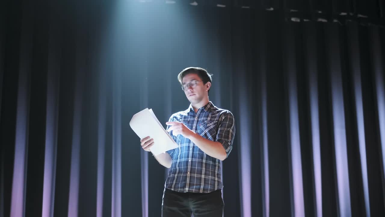 Stock Video Actor Reading His Script On Stage Live Wallpaper for PC