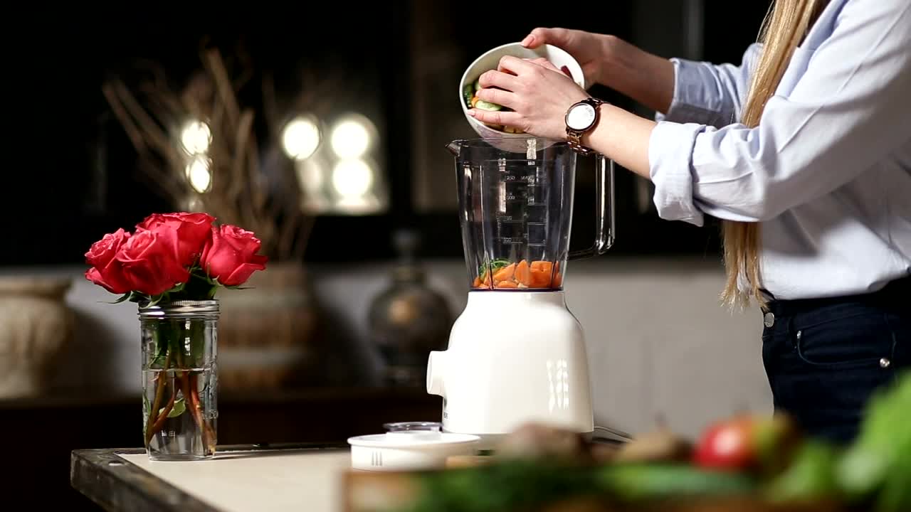 Stock Video Adding Chopped Food To A Blender Live Wallpaper for PC