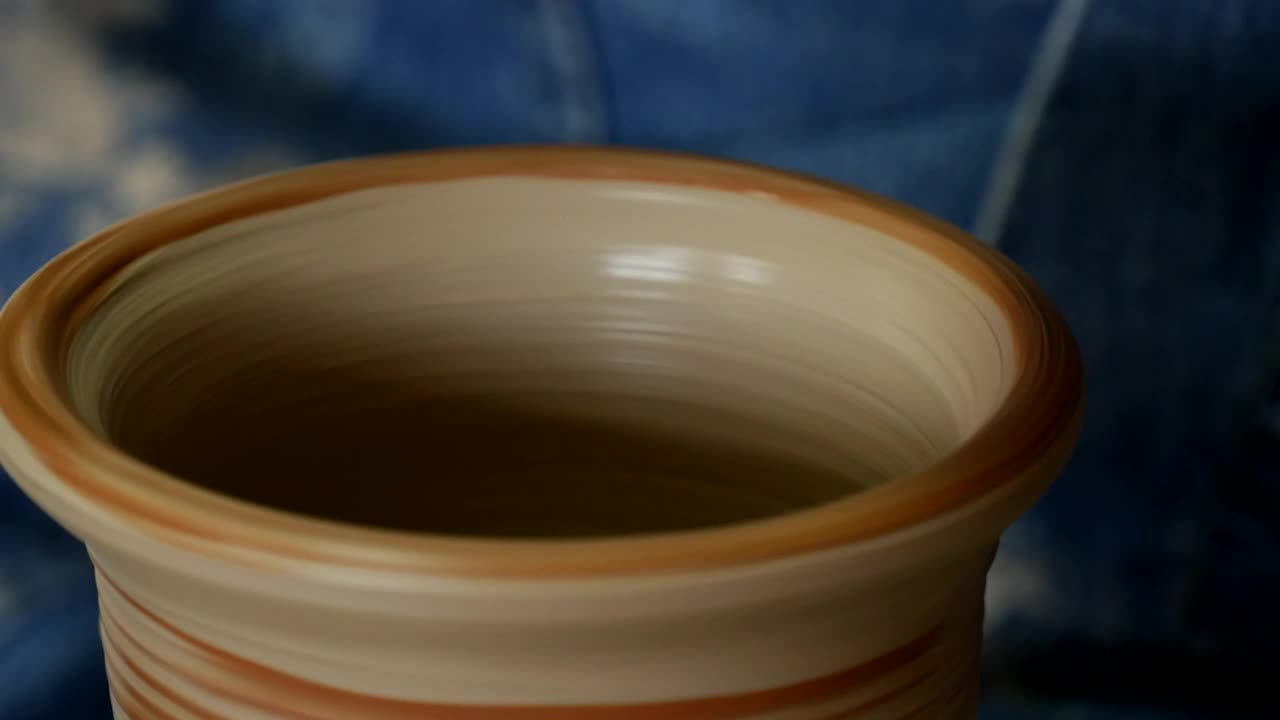 Stock Video Adding Color To A Clay Vase Live Wallpaper for PC
