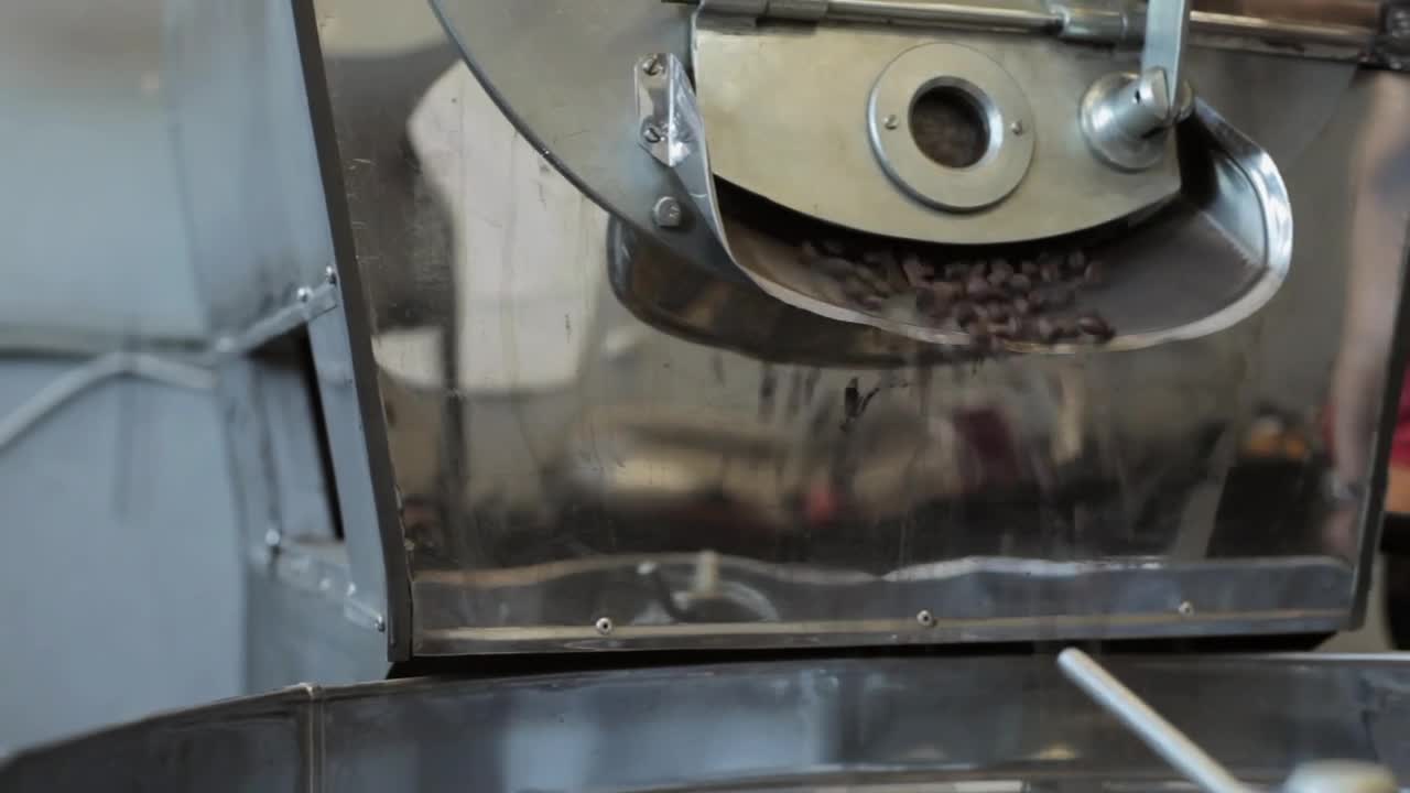 Stock Video Adding Fried Coffee Beans To A Mixer Live Wallpaper for PC