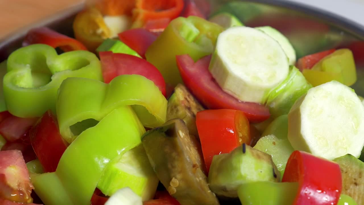 Stock Video Adding Sliced Vegetables To A Dish Live Wallpaper for PC