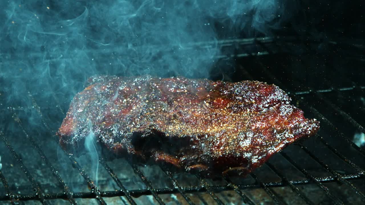 Stock Video Adding Spices To Barbecue Meat In The Grill Live Wallpaper for PC