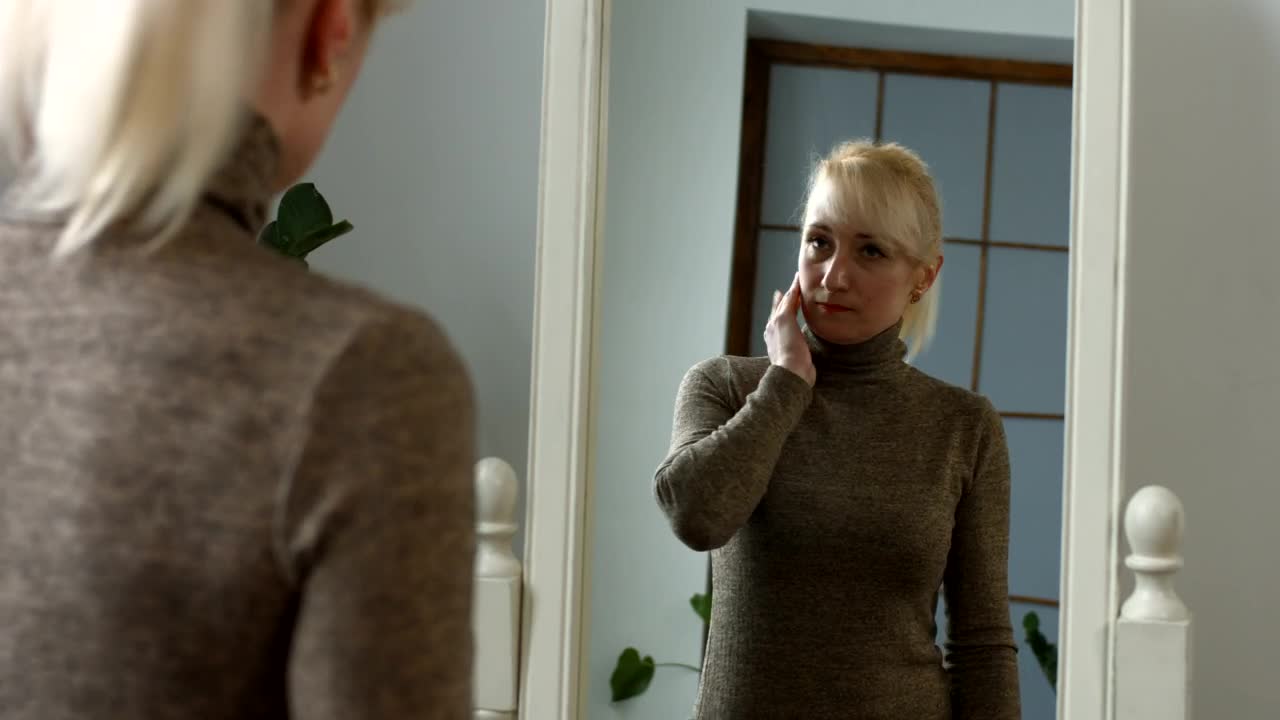 Stock Video Adult Woman Looking In The Mirror Live Wallpaper for PC