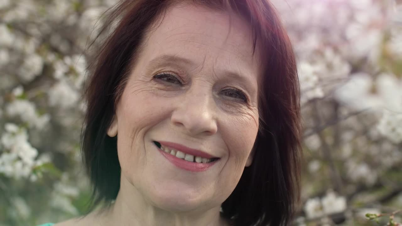 Stock Video Adult Woman Smiling In Nature Portrait Live Wallpaper for PC