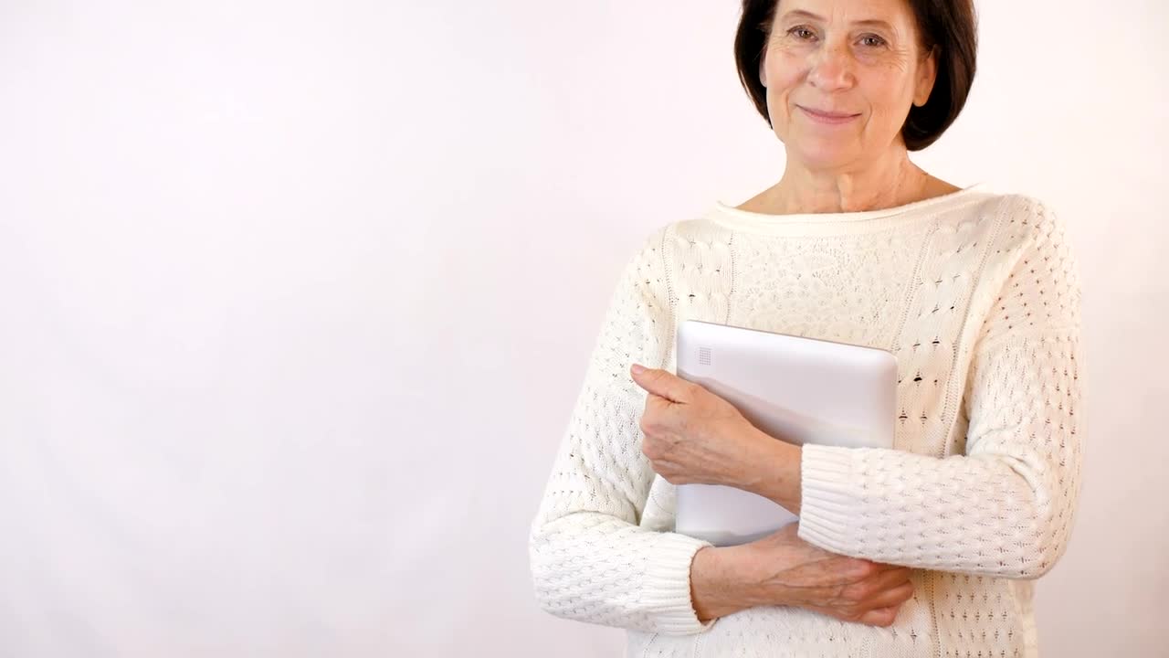 Stock Video Adult Woman Smiling With A Tablet Live Wallpaper for PC