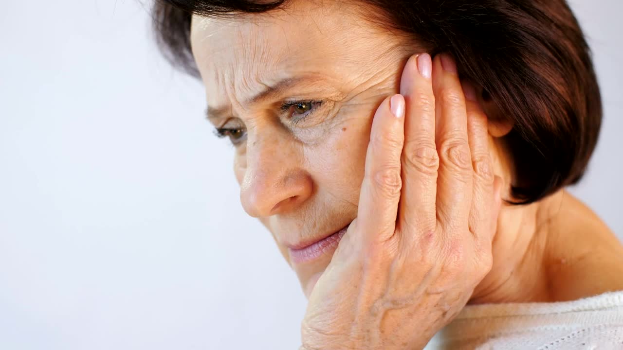 Stock Video Adult Woman With Hand On Head Gesturing Pain Live Wallpaper for PC