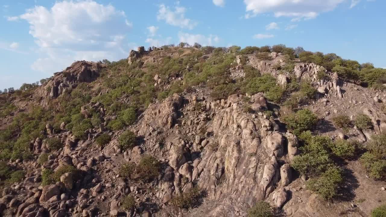 Stock Video Aerial Landscape Around An Arid And Rocky Mountain Range Live Wallpaper for PC