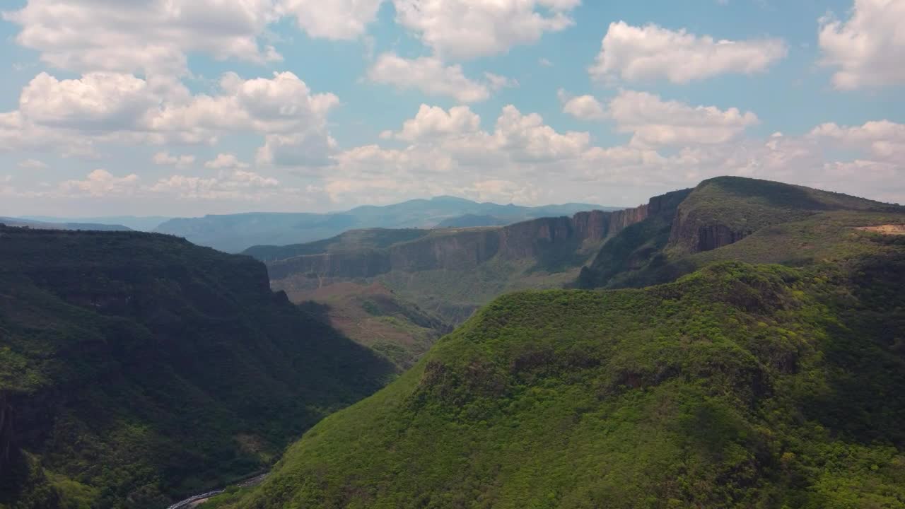 Stock Video Aerial Landscape Of A Canyon Covered With Vegetation Live Wallpaper for PC
