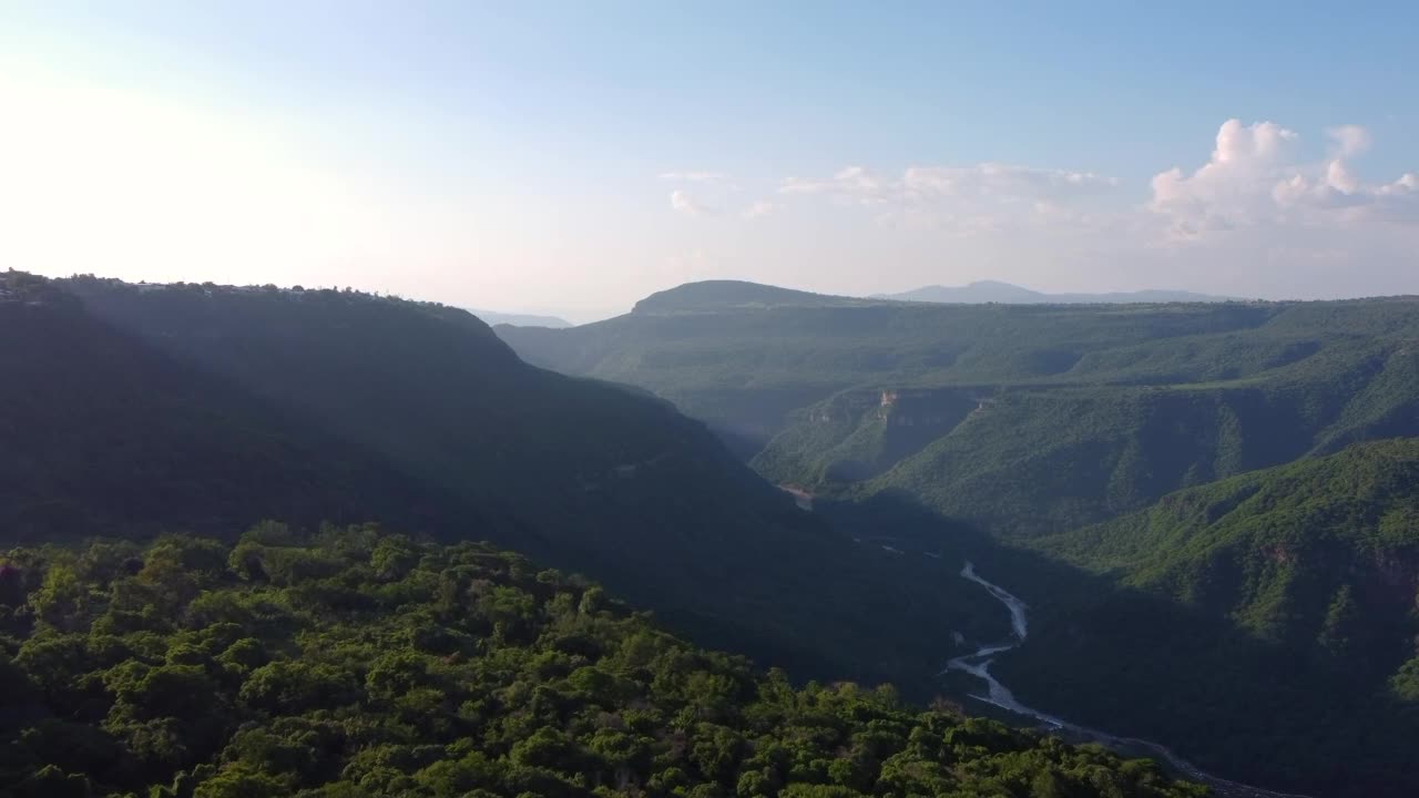 Stock Video Aerial Landscape Over A Vegetation Covered Canyon Live Wallpaper for PC