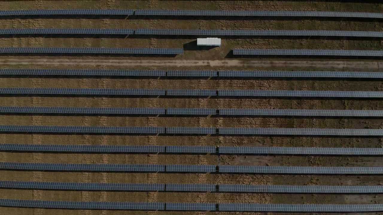 Stock Video Aerial Shot From Above Of A Field Of Solar Panels Live Wallpaper for PC