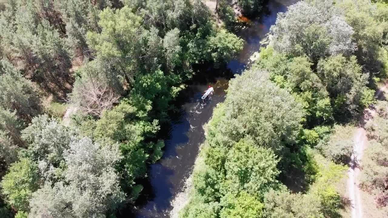 Stock Video Aerial Shot Of A Canoe Ride On A River Live Wallpaper for PC