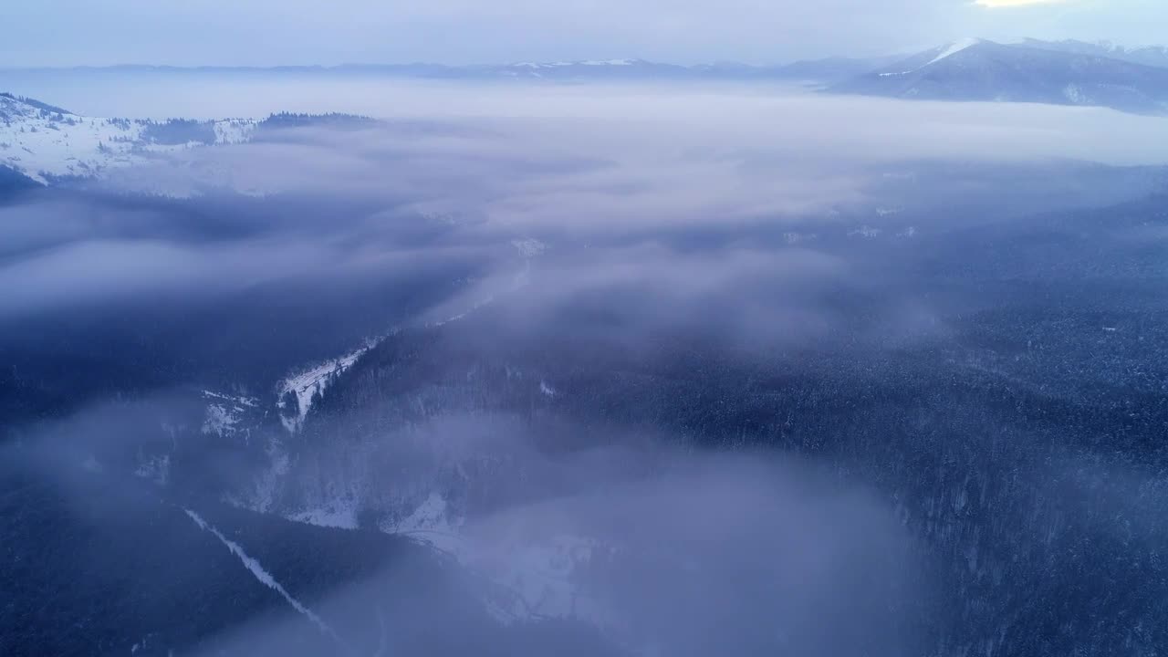 Stock Video Aerial Shot Of A Foggy Winter Landscape Live Wallpaper for PC