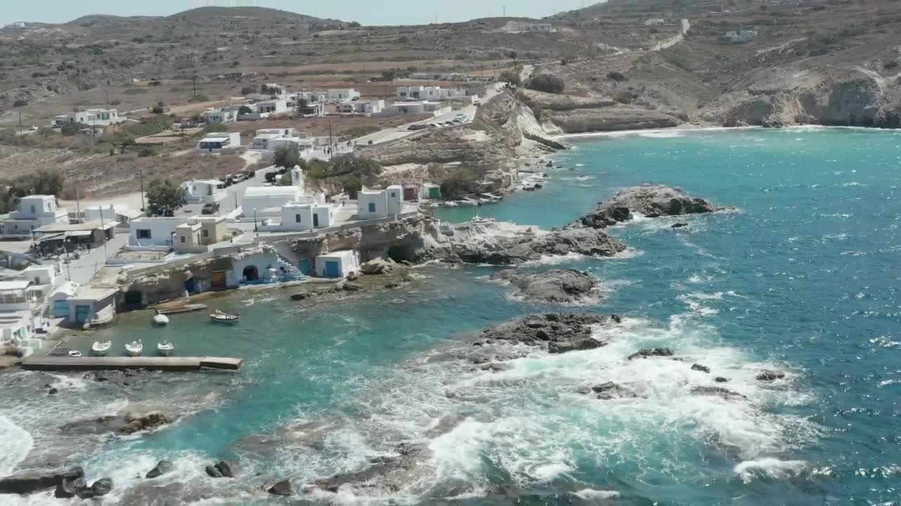 Stock Video Aerial Shot Of A Port Village Seen From The Sea Live Wallpaper for PC