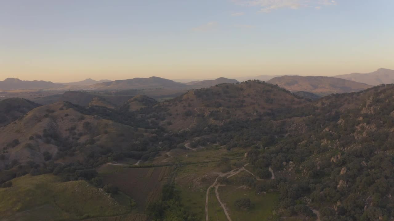 Stock Video Aerial Shot Of A Tree Covered Mountain Range Live Wallpaper for PC
