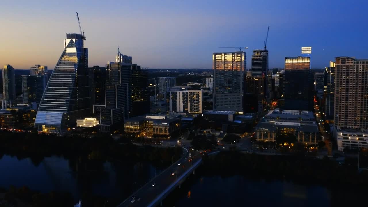 Stock Video Aerial Tour Over A Big City At Dusk Live Wallpaper for PC