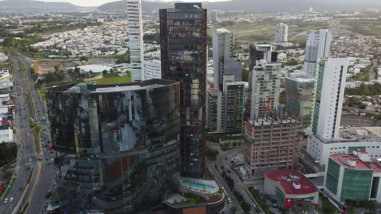 Stock Video Aerial View Above The Skyscrapers Of A City Live Wallpaper for PC