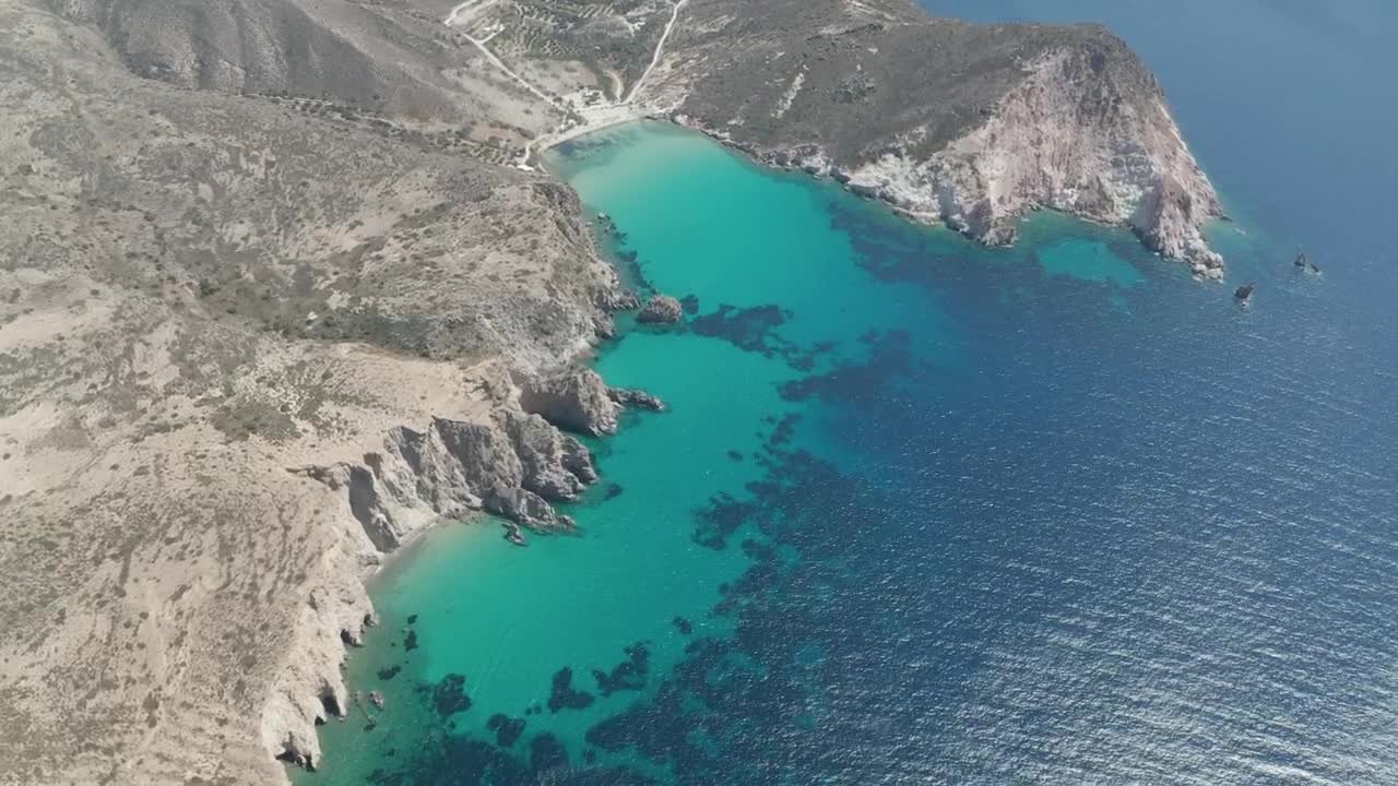 Stock Video Aerial View Of A Bay With Crystal Clear Blue Water Live Wallpaper for PC