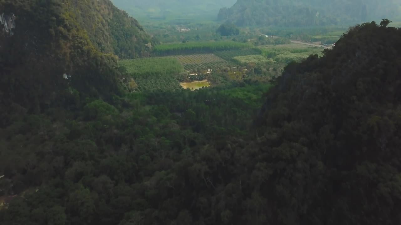 Stock Video Aerial View Of A Beautiful Green Landscape Full Of Relief Live Wallpaper for PC