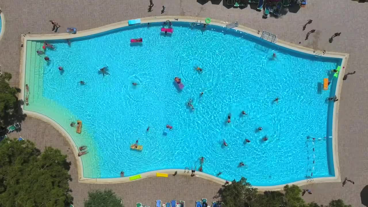 Stock Video Aerial View Of A Crowded Swimming Pool Live Wallpaper for PC