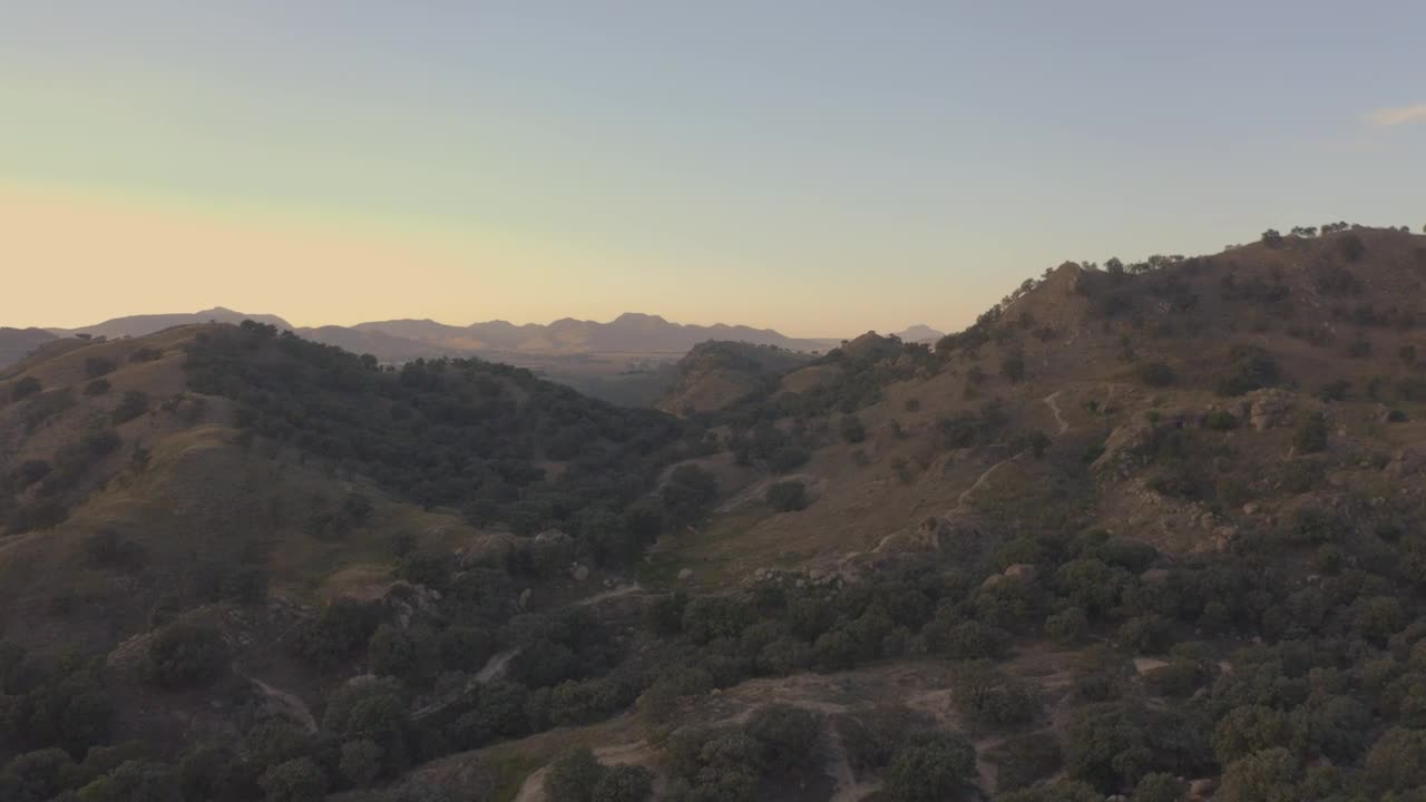 Stock Video Aerial View Of A Natural Relief Covered With Vegetation Live Wallpaper for PC