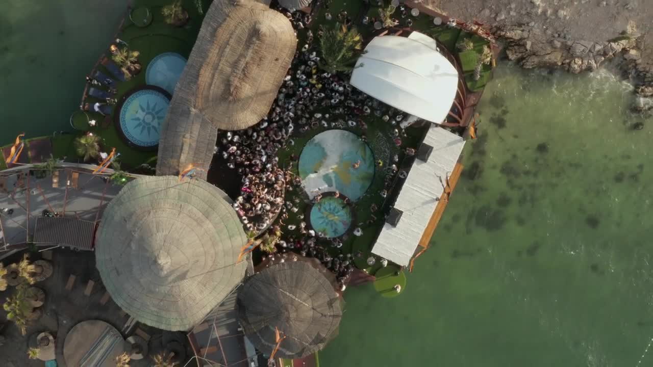 Stock Video Aerial View Of A Small Spring Festival In The Beach Live Wallpaper for PC