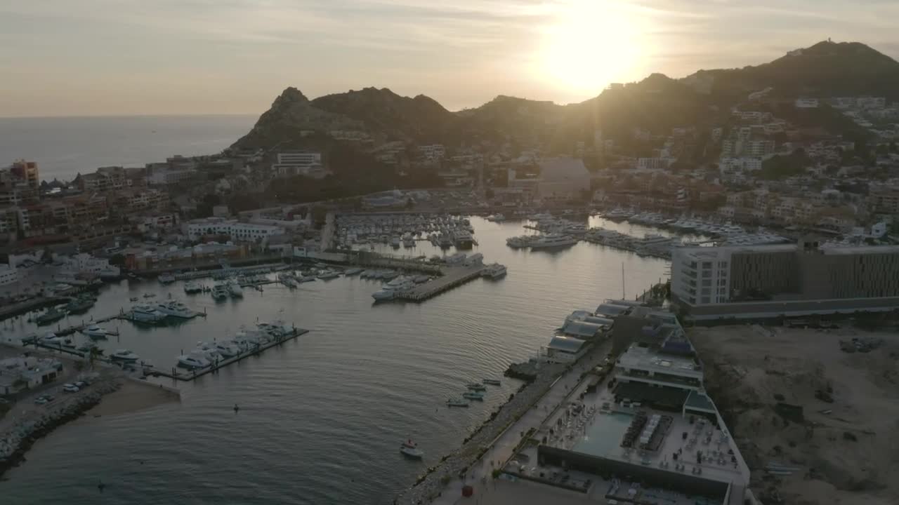 Stock Video Aerial View Of A Tourist Port During Sunset Live Wallpaper for PC