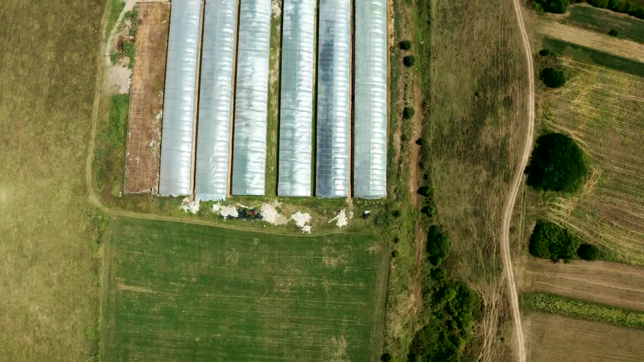 Stock Video Aerial View Of Agricultural Growth Center In Countryside Live Wallpaper for PC