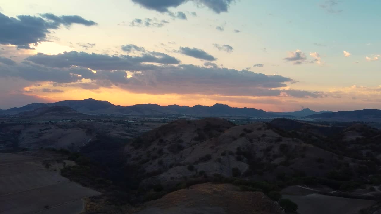 Stock Video Aerial View Of An Arid Landscape During Sunset Live Wallpaper for PC