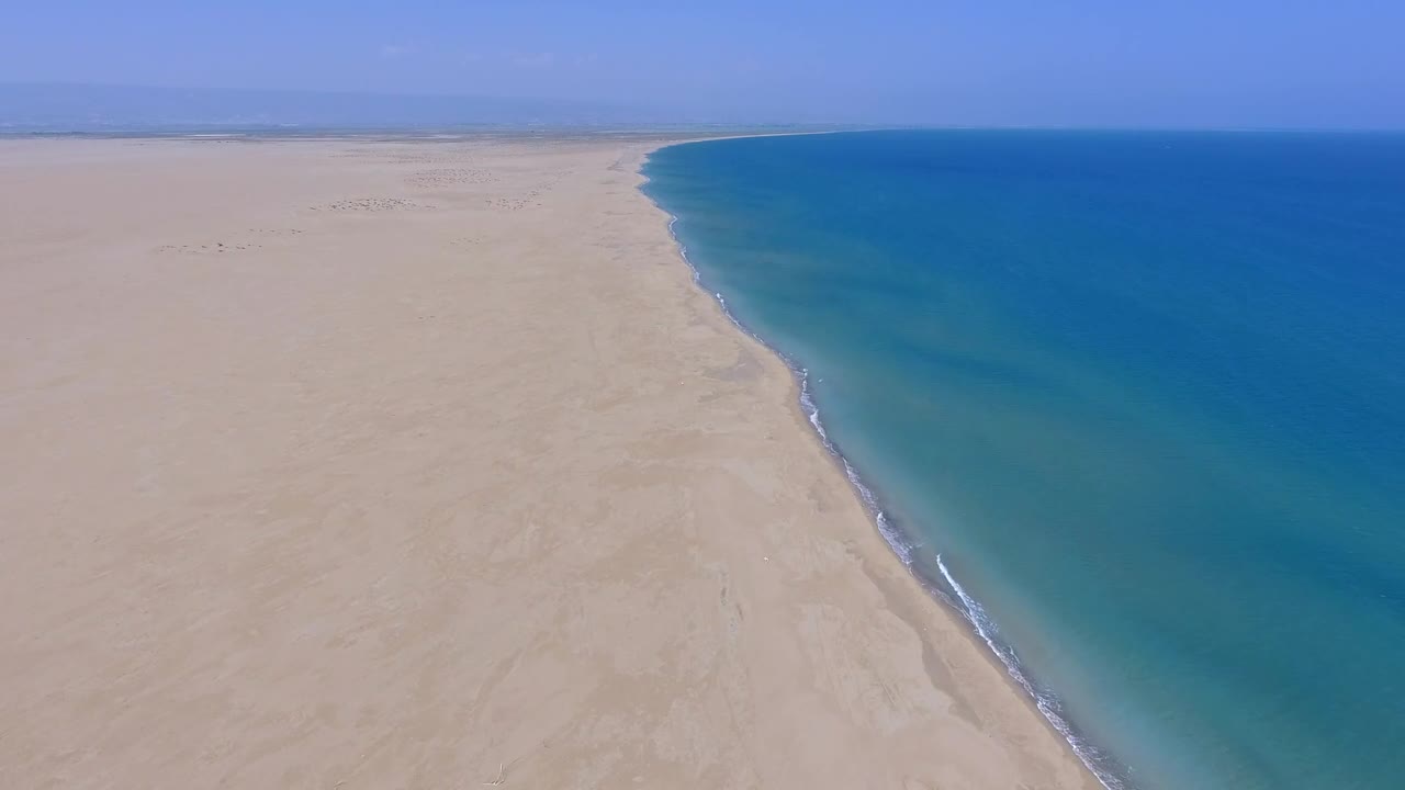 Stock Video Aerial View Of An Enormous Beach And A Blue Ocean Live Wallpaper for PC