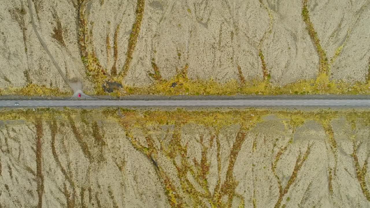 Stock Video Aerial View Of Cars Driving Through A Desert Road Live Wallpaper for PC