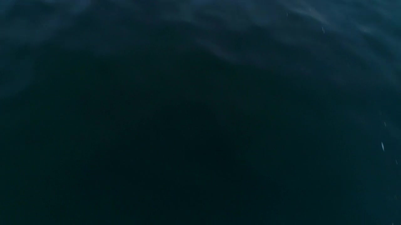 Stock Video Aerial View Of Deep Blue Sea And Pink Sunset Reflection Live Wallpaper for PC