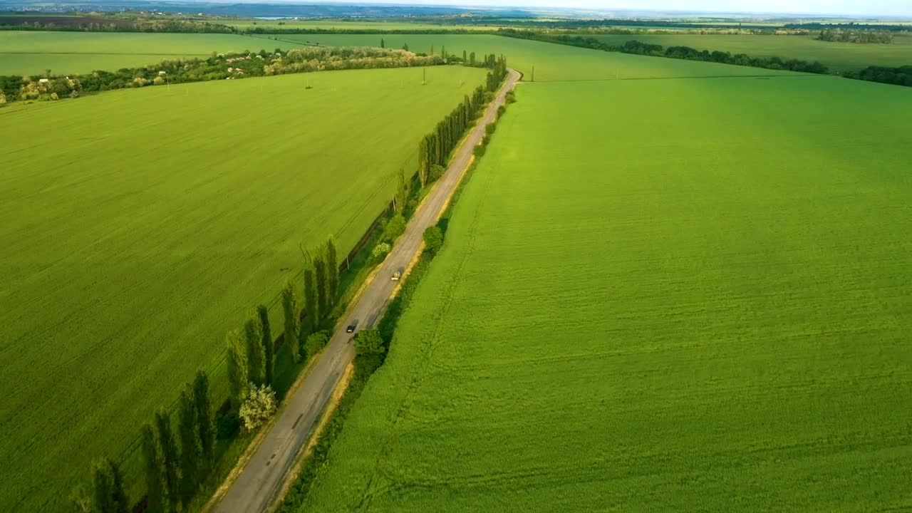 Stock Video Aerial View Of Green Fields And A Road Live Wallpaper for PC